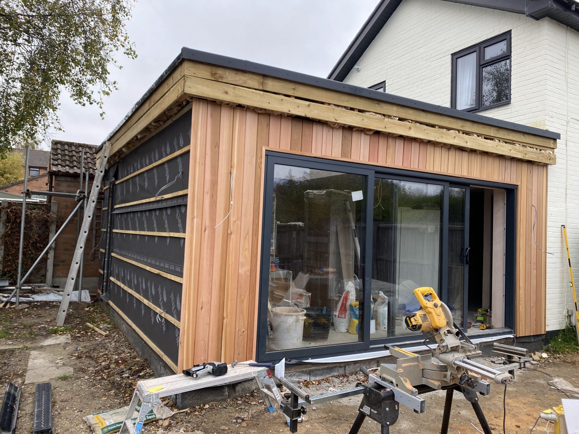 House Extensions Bournemouth (optimised) Timber-clad extension built by builders in Bournemouth